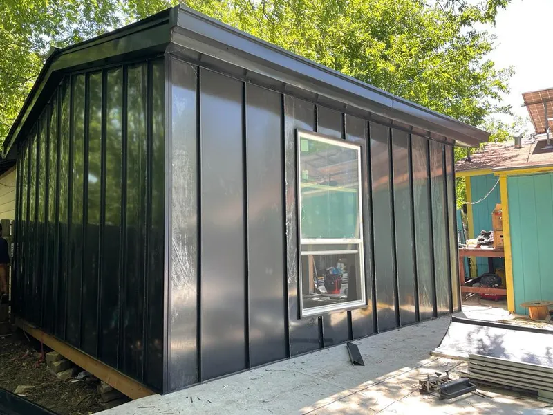 Black standing seam metal wall panels for Metal Roof Installation in West Memphis